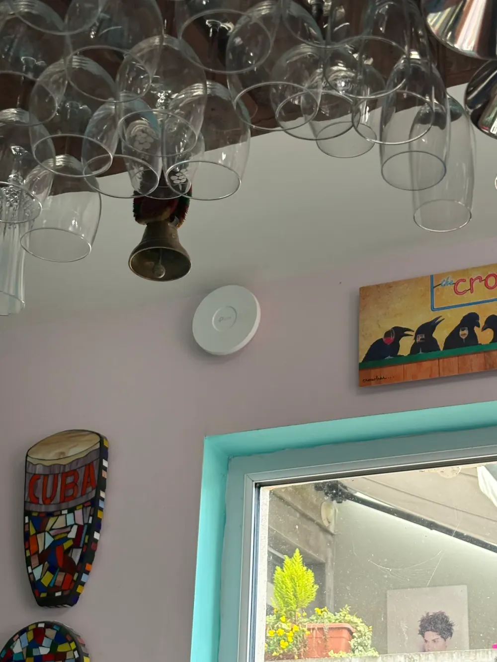 TP-Link Omada access point mounted on the wall in Louis’s home