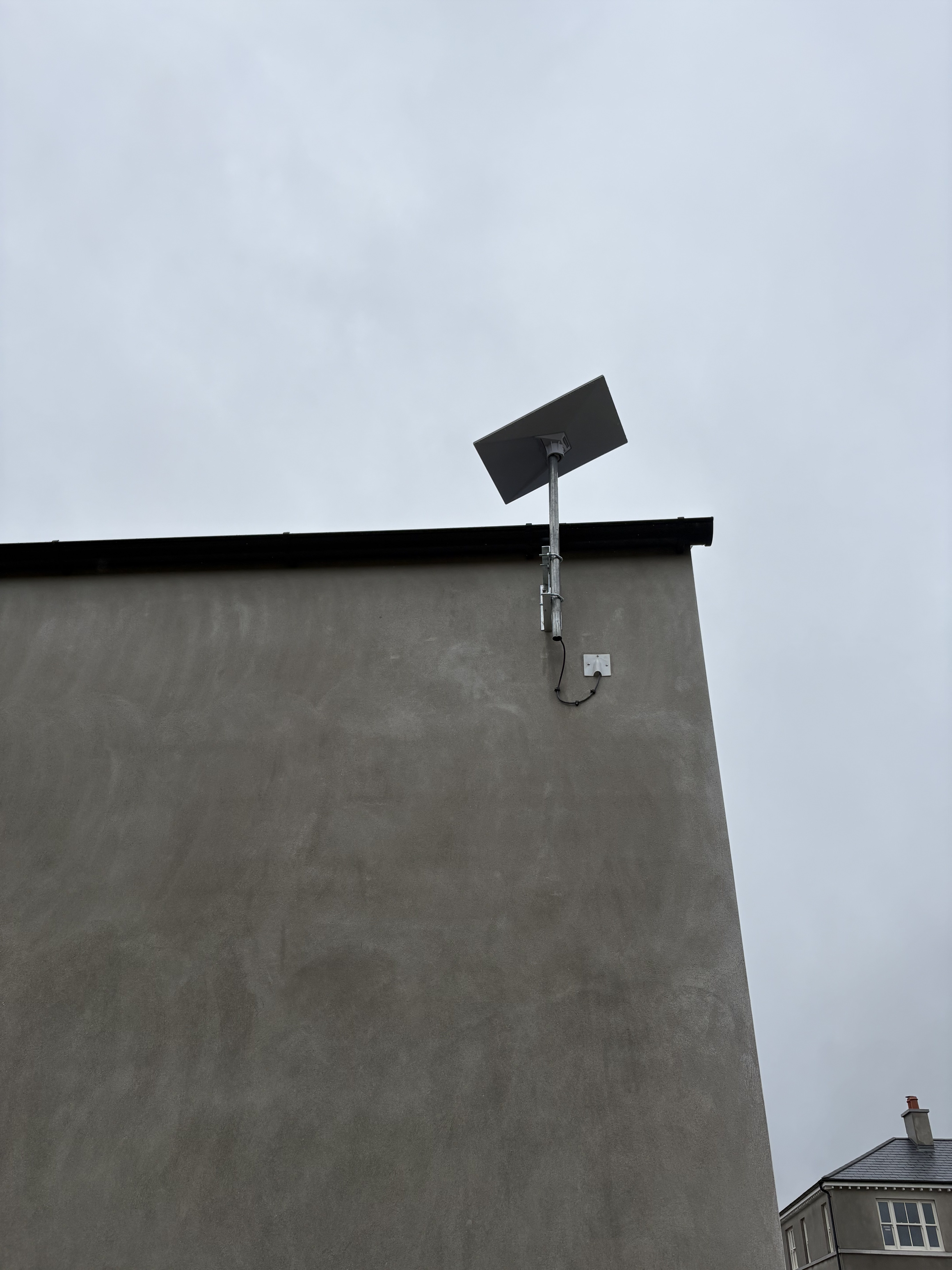Starlink installed neatly at the back of the outbuilding for Sean's new build in Dublin